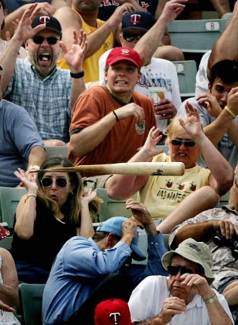 bate de baseball dans le public